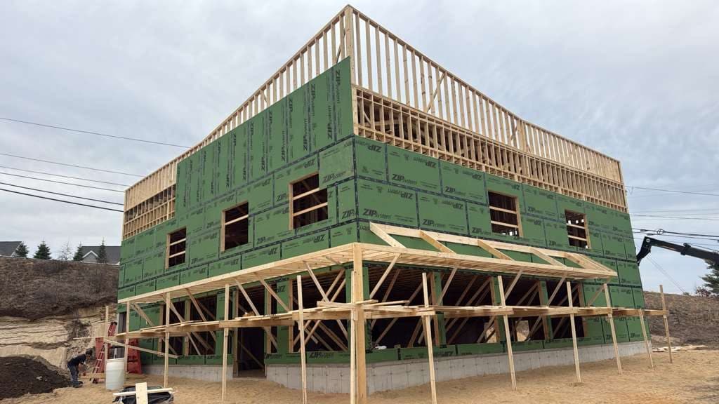 New home construction framing by RS Development Group in Wellesley, MA