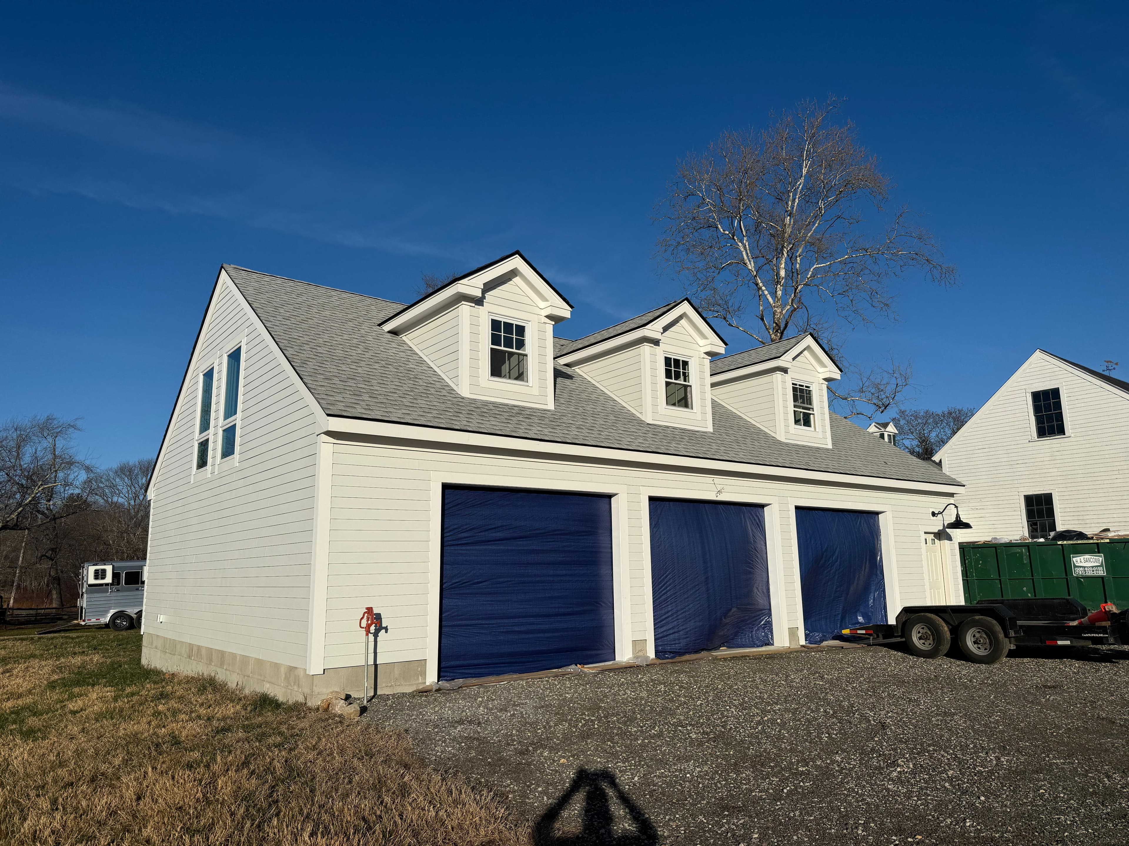 James Hardie fiber cement siding installation on Massachusetts colonial home